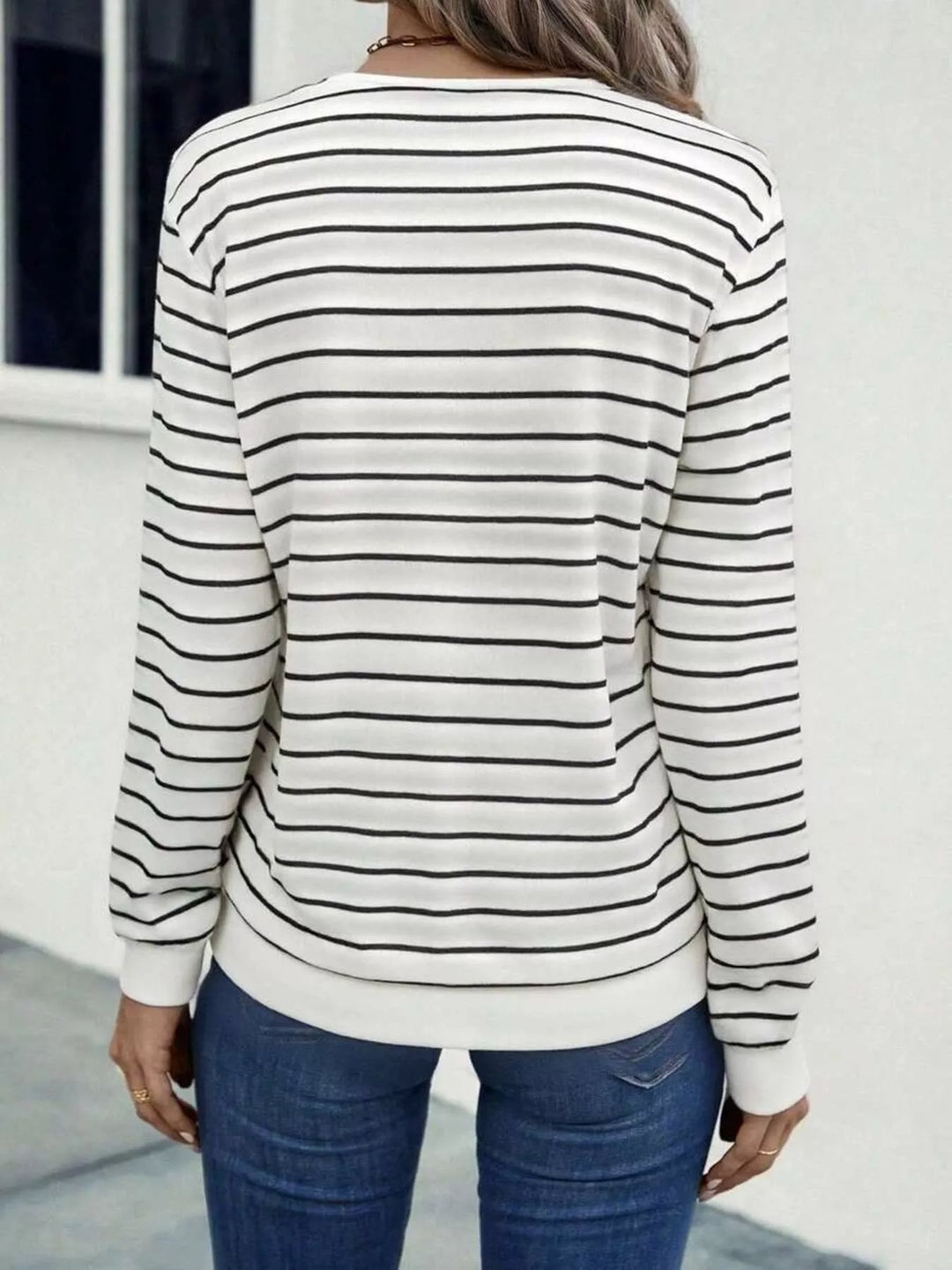 Striped V-neck long sleeve top with contrast trim
