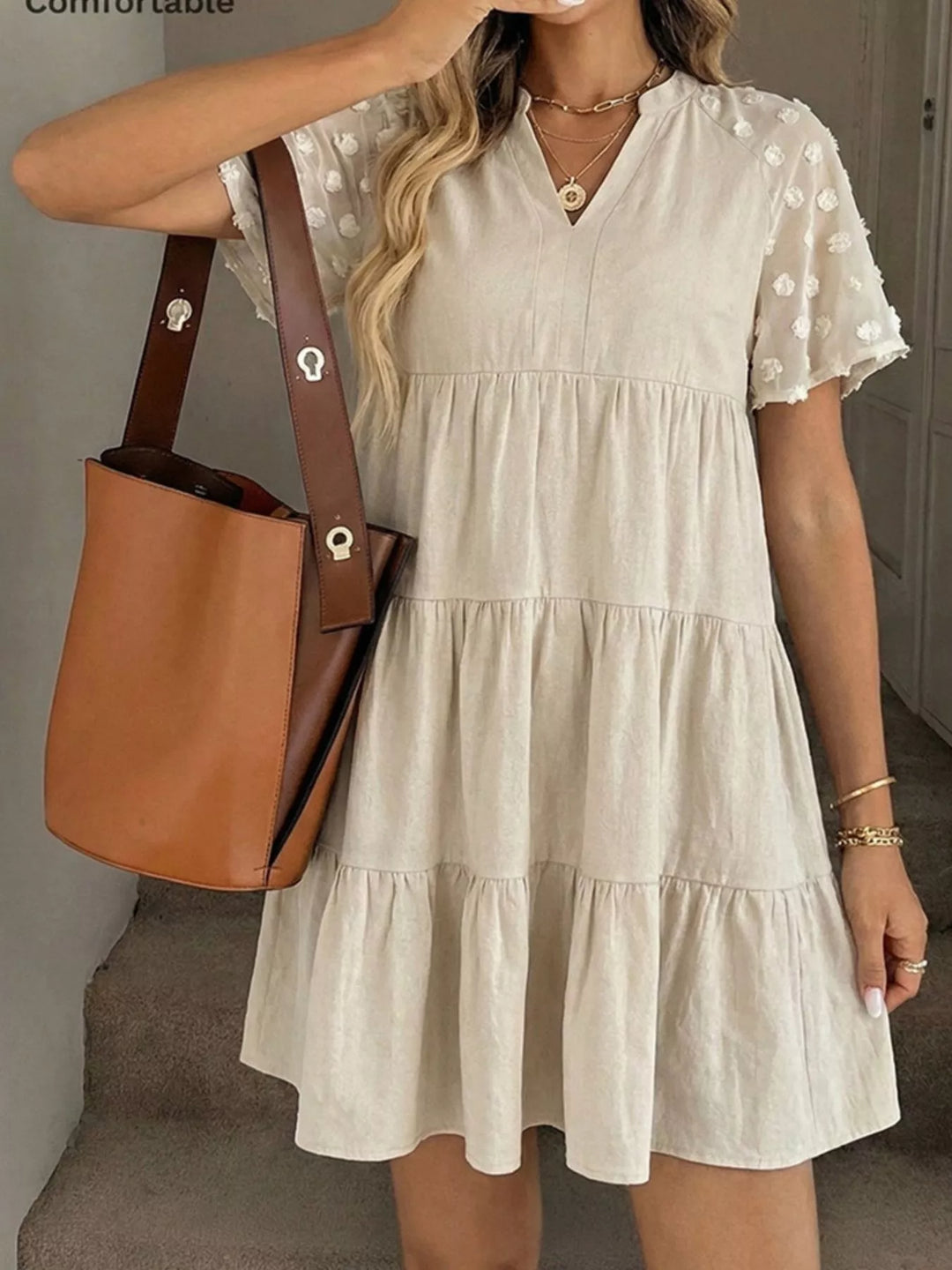 Swiss dot short-sleeve tiered cotton mini dress