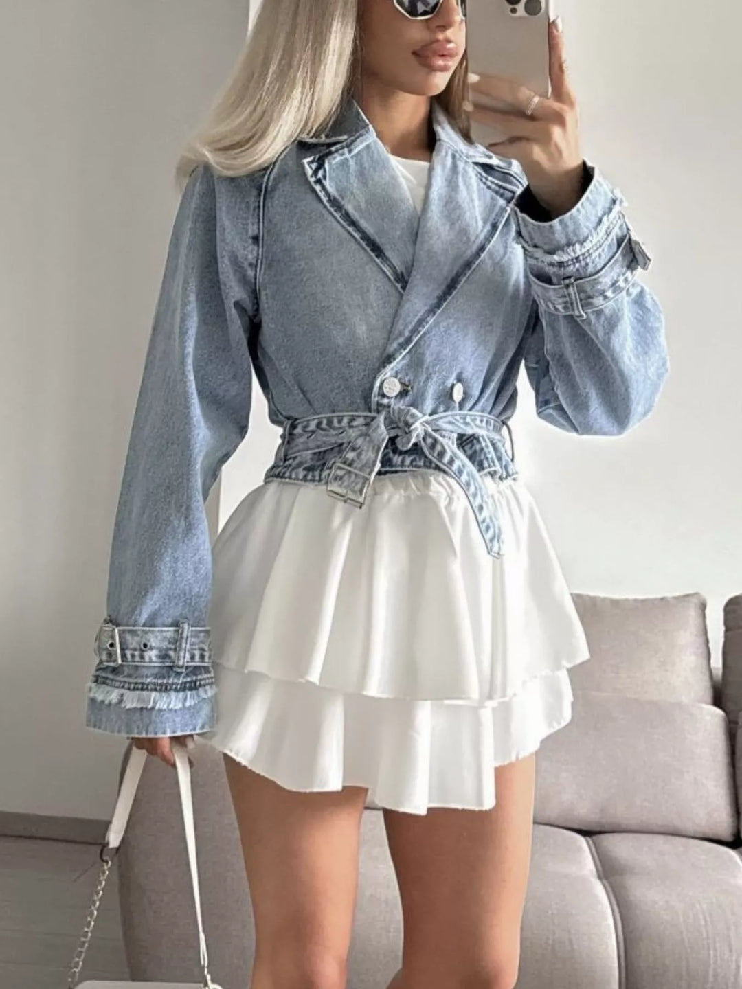 Cropped double-breasted denim jacket with belted cuffs
