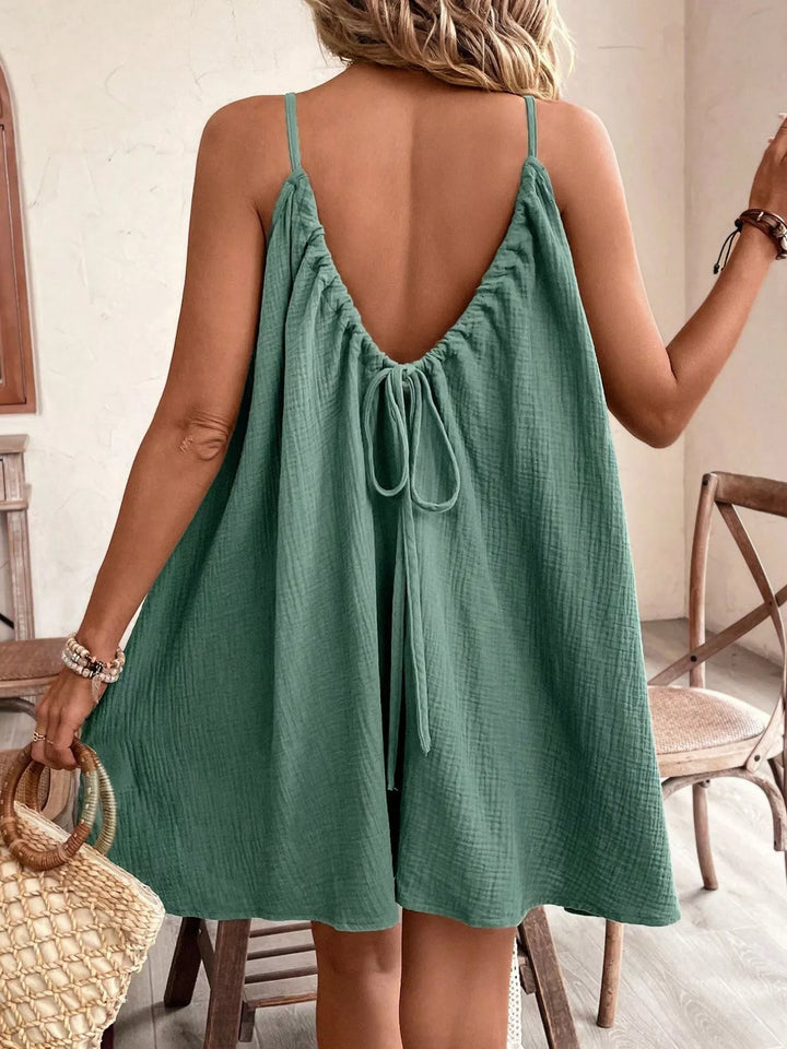 Backless crinkle spaghetti strap mini dress