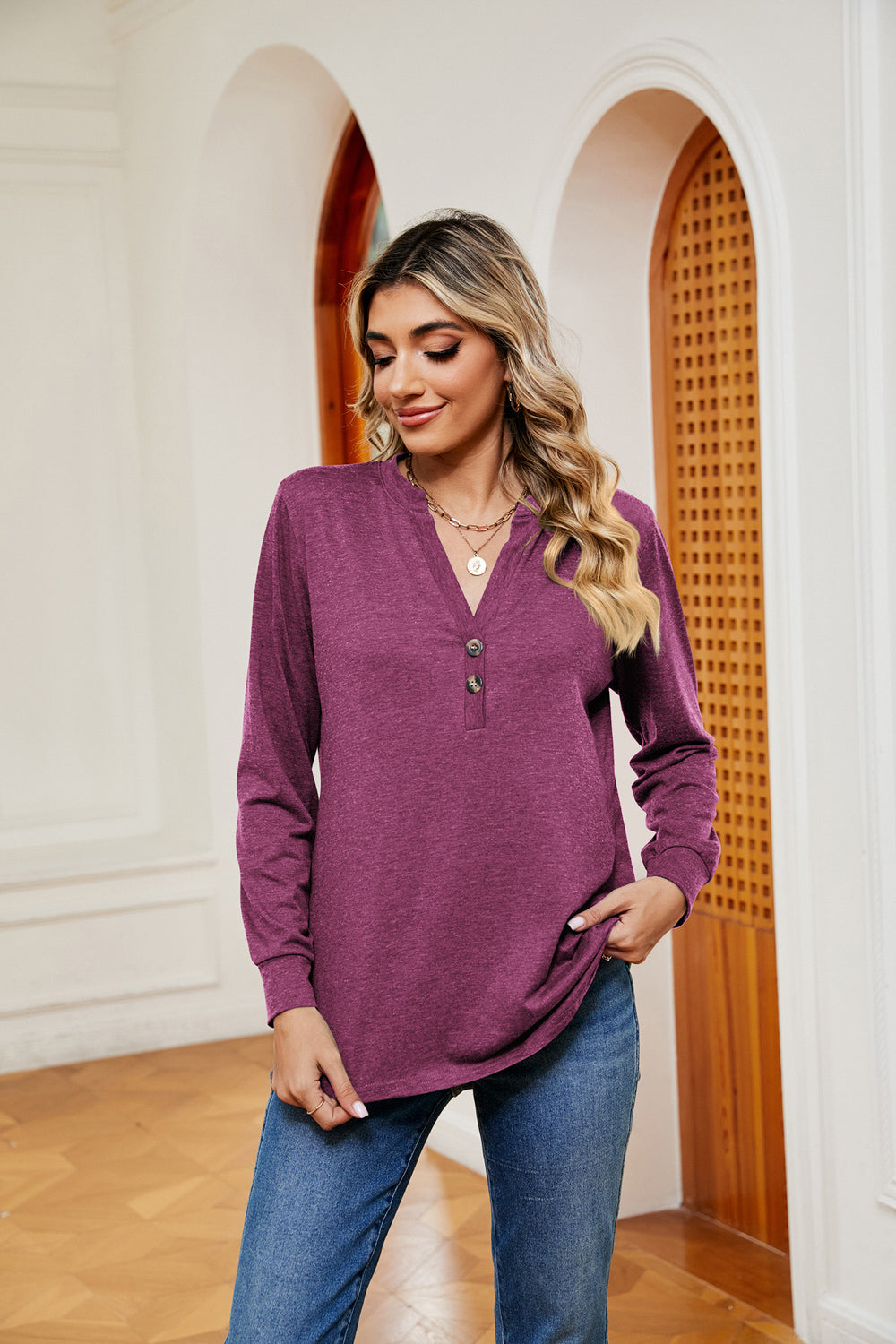 Notch neck long sleeve top with button placket