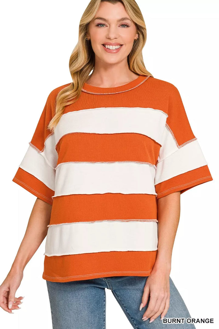 BURNT ORANGE French terry striped top with exposed raw seam detail