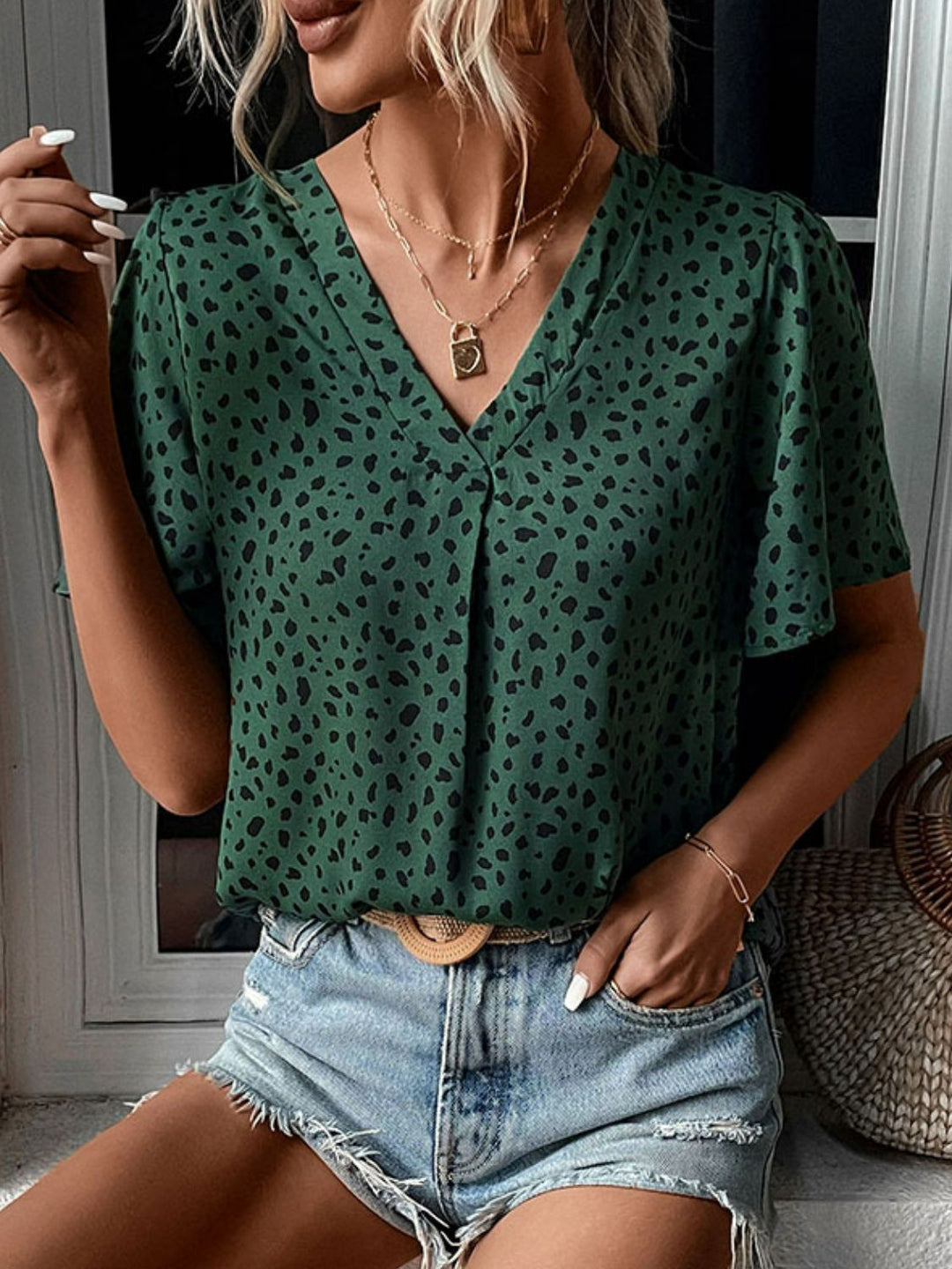 Flutter sleeve animal print V-neck blouse