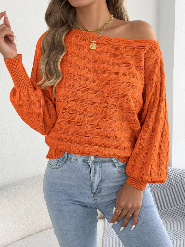 Cable knit boat neck sweater with dolman sleeves