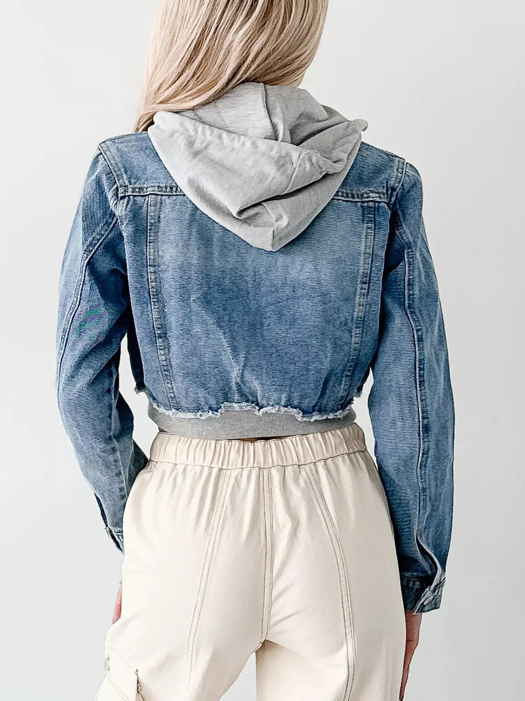 Distressed cropped hooded denim jacket with zip front