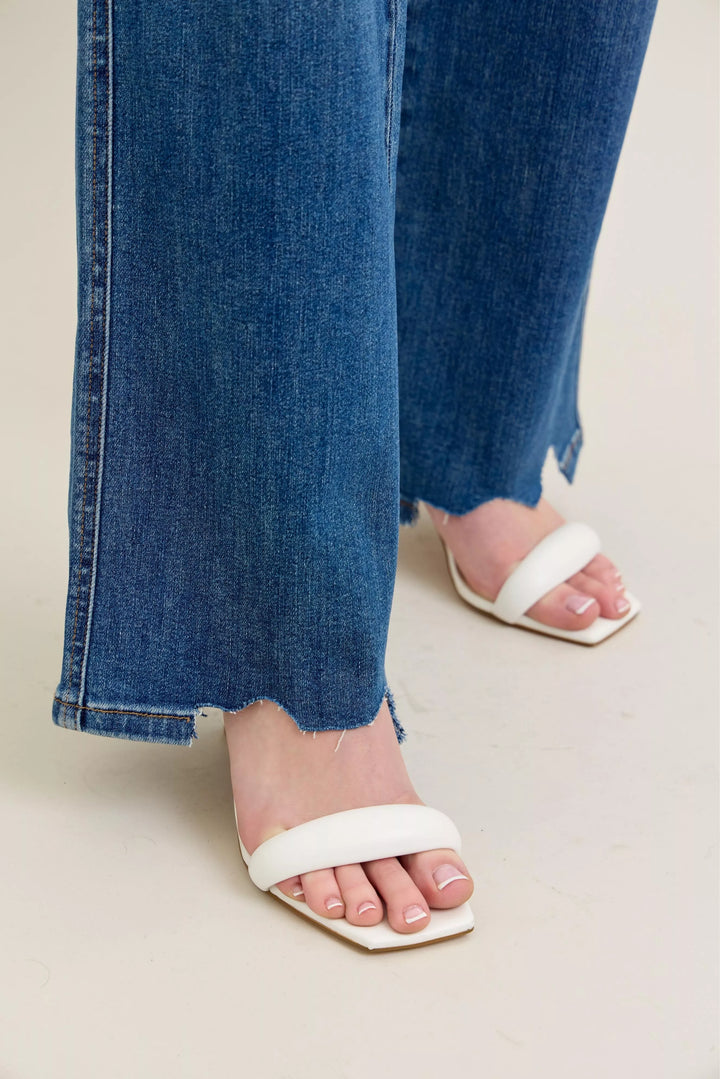 High-rise tummy control wide leg jeans with raw chewed hem