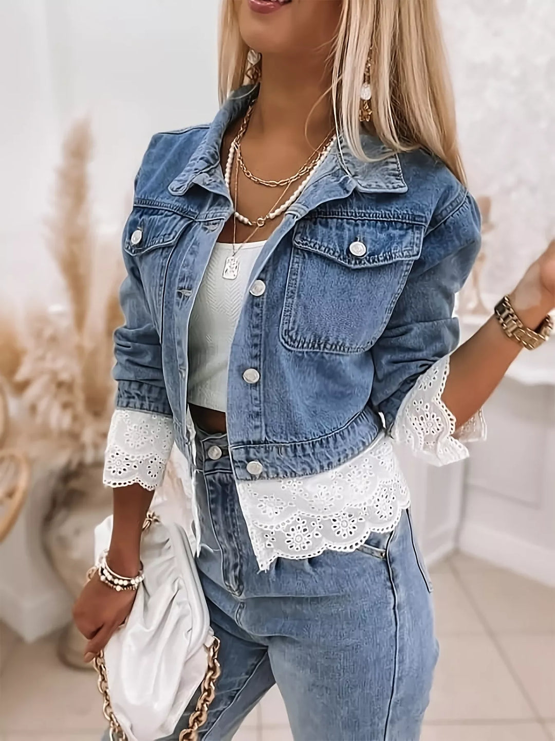 Cropped denim jacket with eyelet lace trim