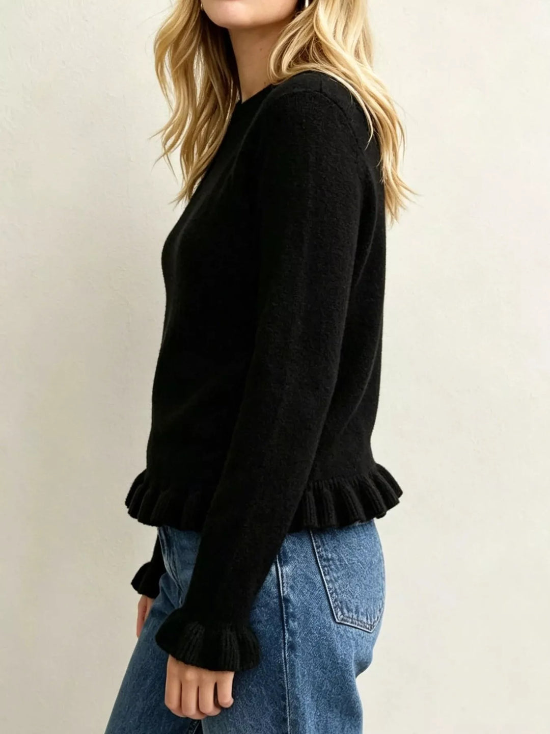 Ruffle hem crew neck knit sweater with ruffled cuffs