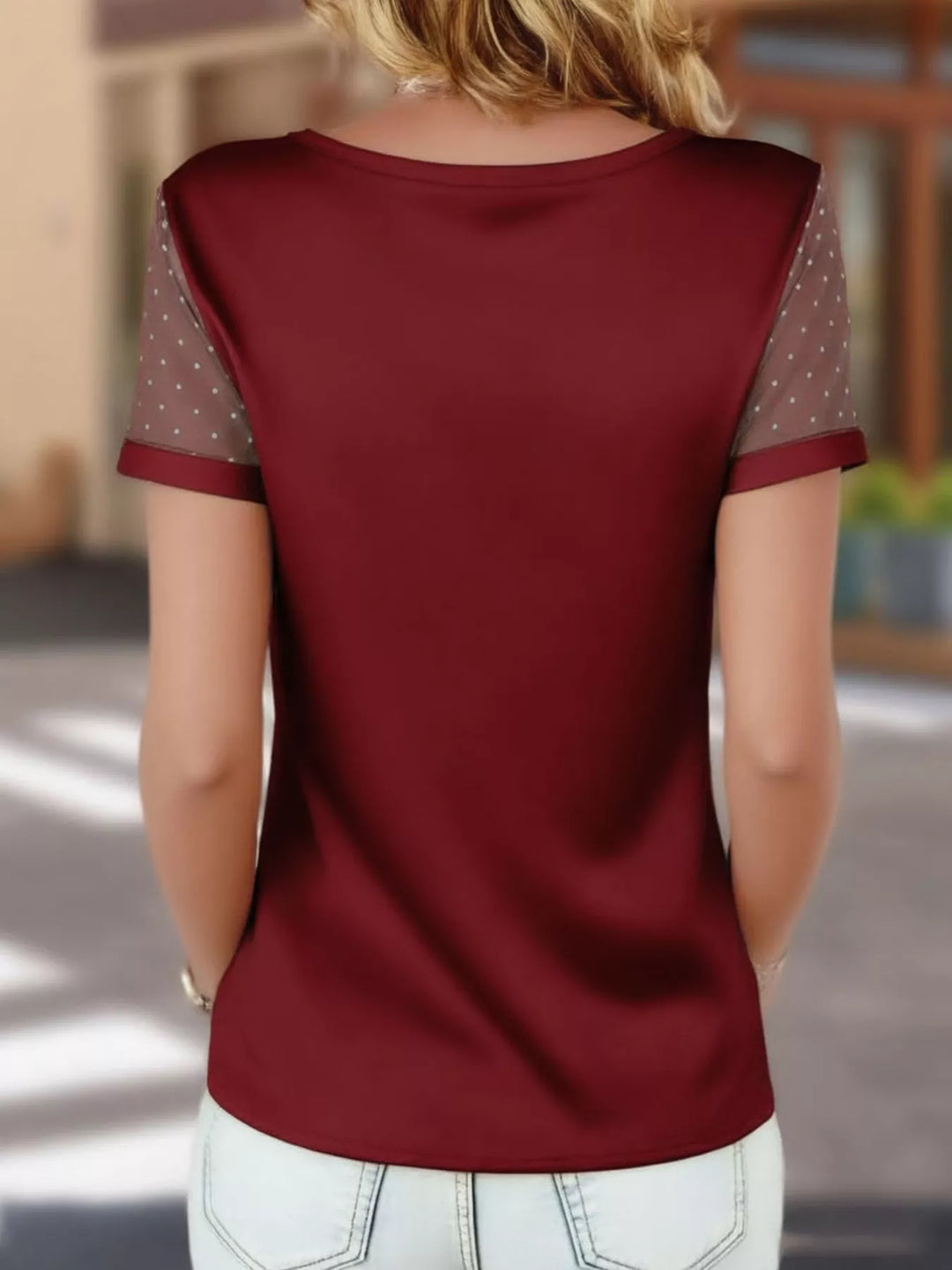 Satin v-neck top with sheer polka dot mesh sleeves