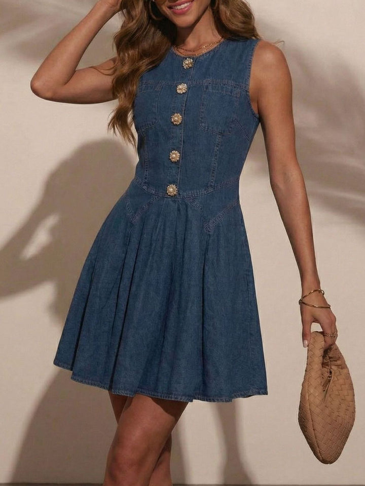 Sleeveless denim mini dress with jeweled buttons