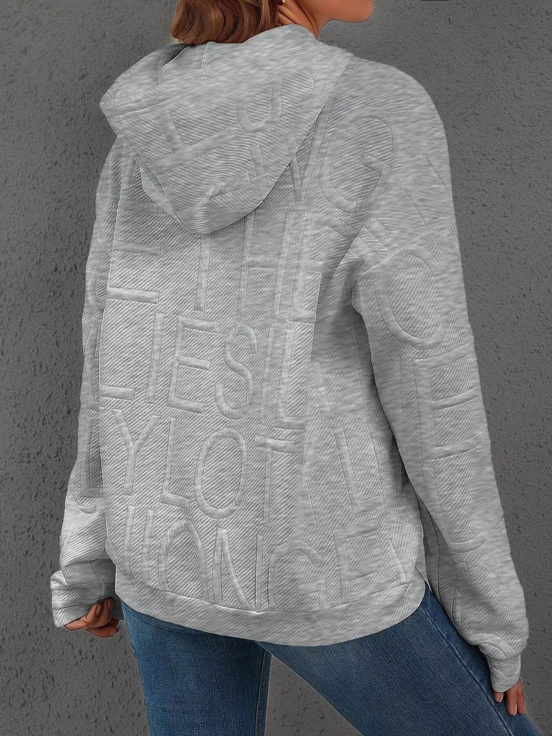 Textured embossed letter pullover hoodie with front pocket