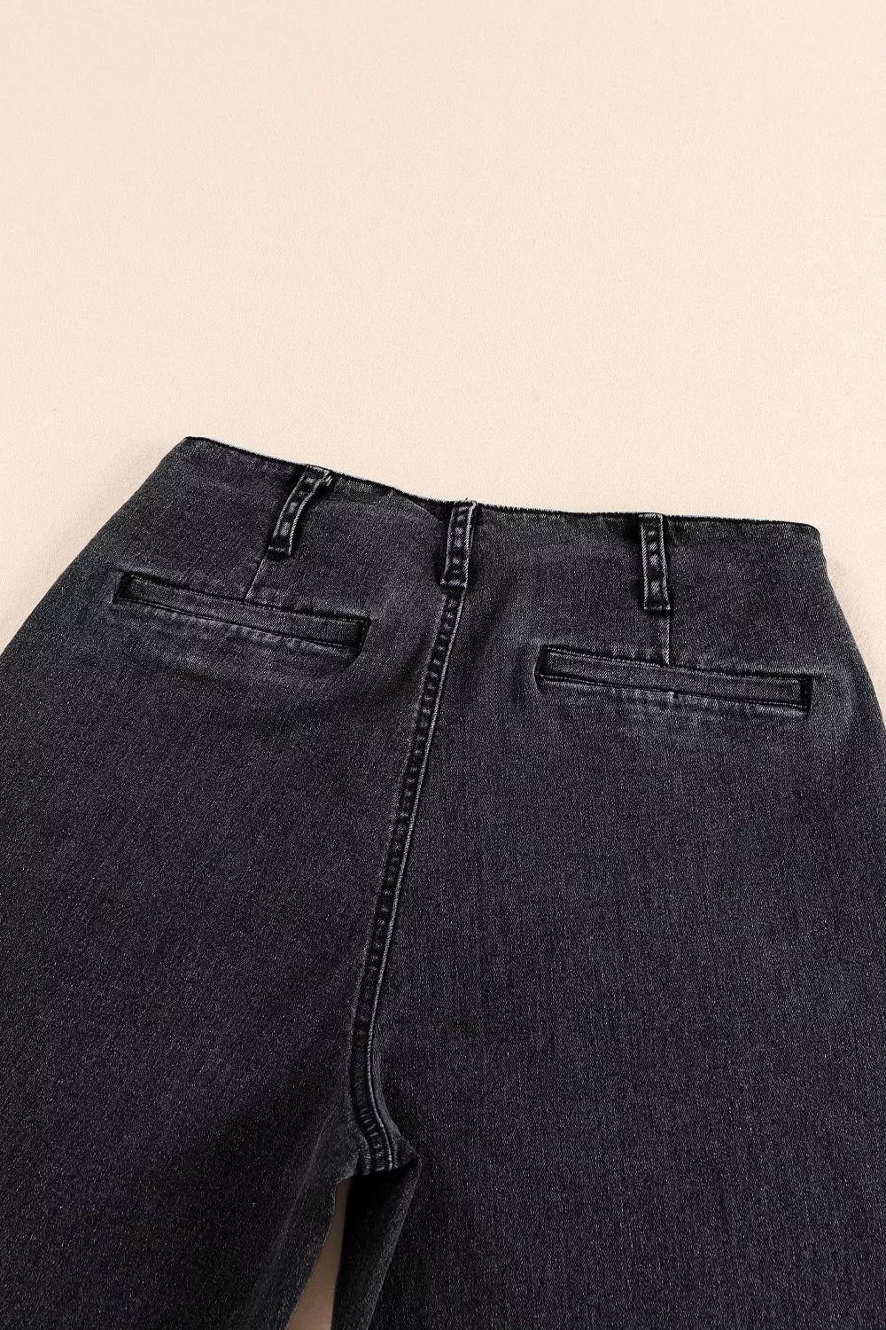 High-rise button-fly wide-leg jeans with patch pockets