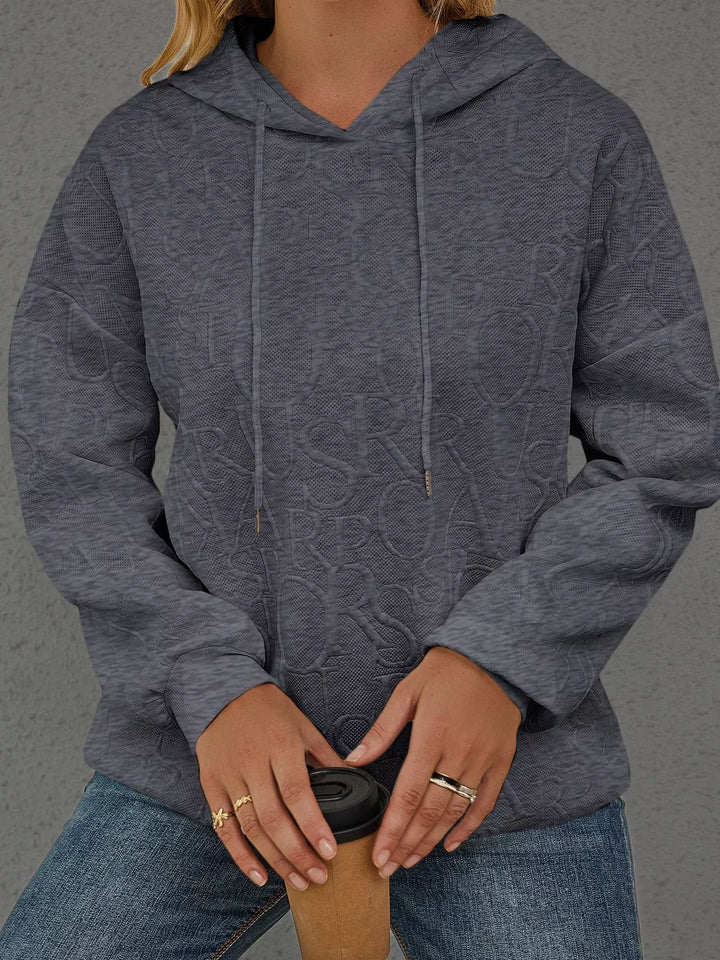 Embossed lettering drawstring pullover hoodie