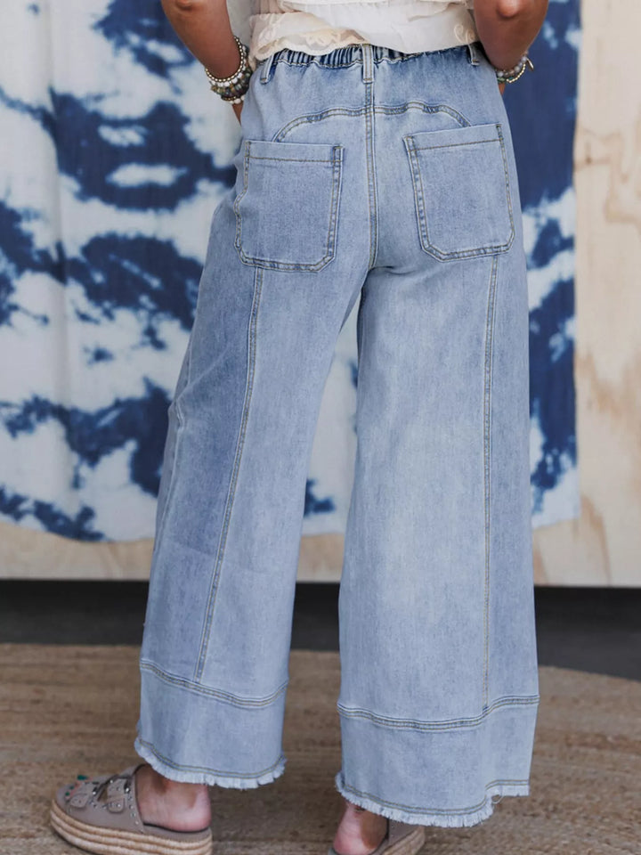 Wide-leg drawstring jeans with raw frayed hem