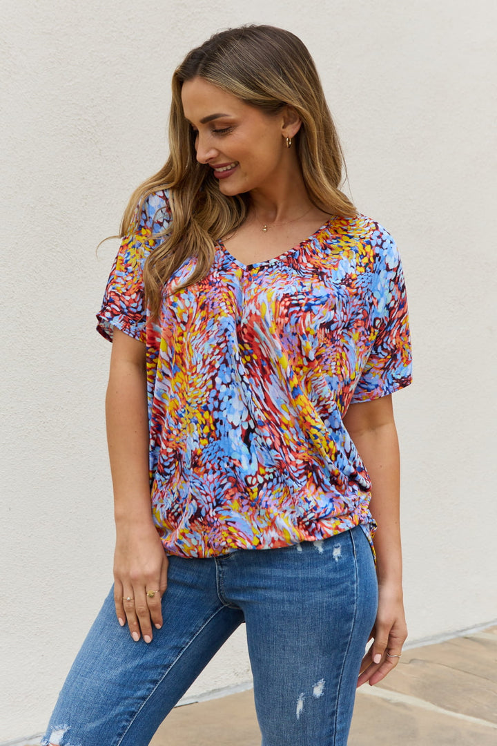 Abstract print dolman sleeve flowy V-neck top