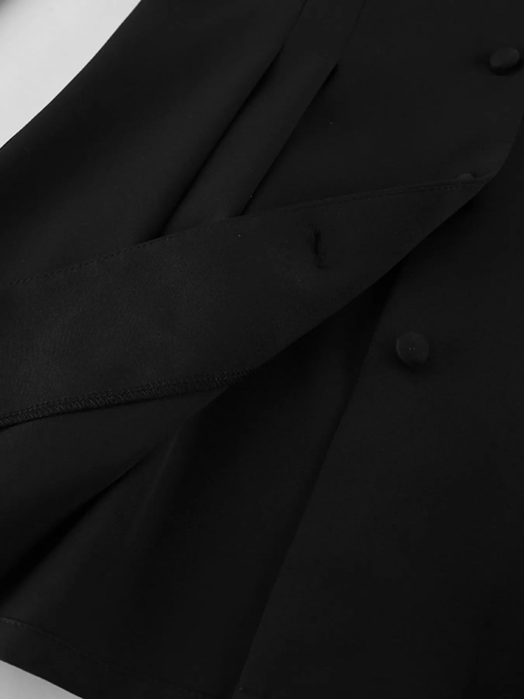 Collarless button-front jacket with cinched pleated waist