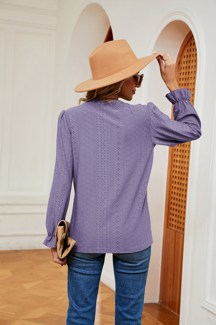 Eyelet V-neck blouse with flounce sleeves and lace trim