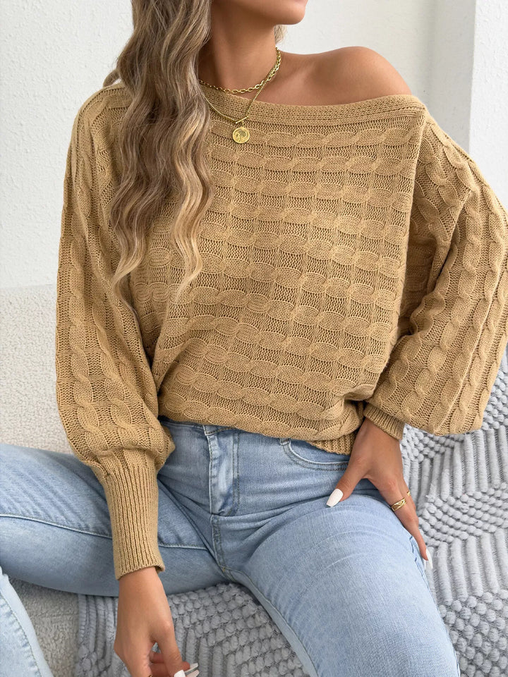 Cable knit boat neck sweater with dolman sleeves