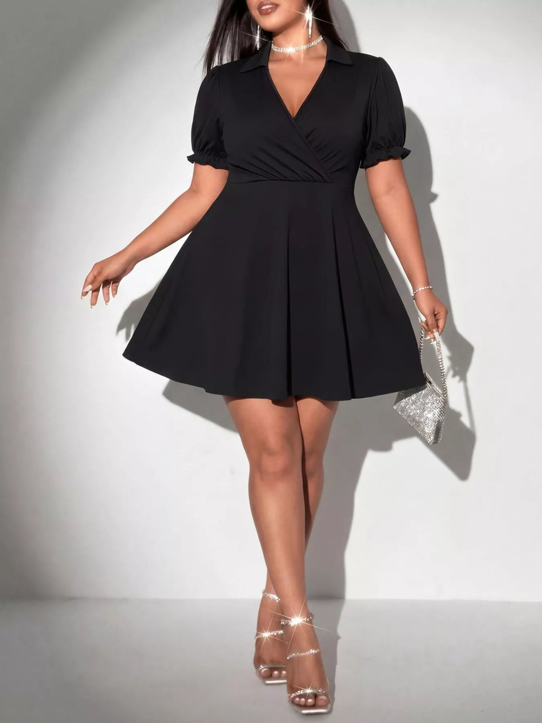 Black Ruched surplice plus size mini dress with puff sleeves