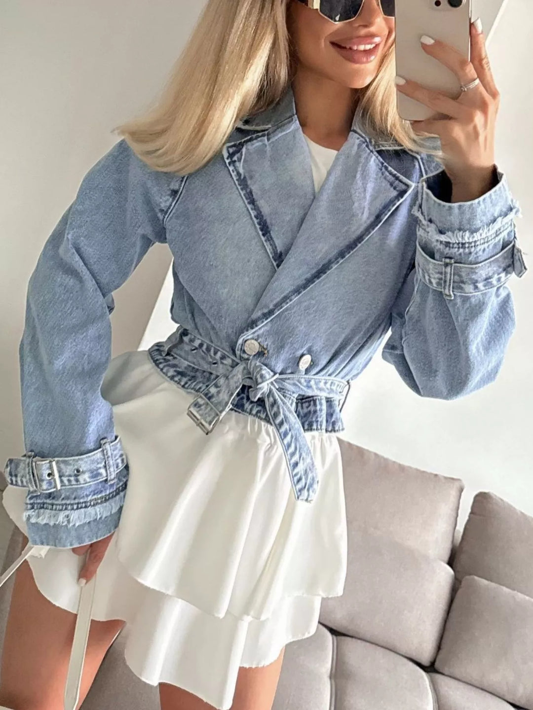 Cropped double-breasted denim jacket with belted cuffs