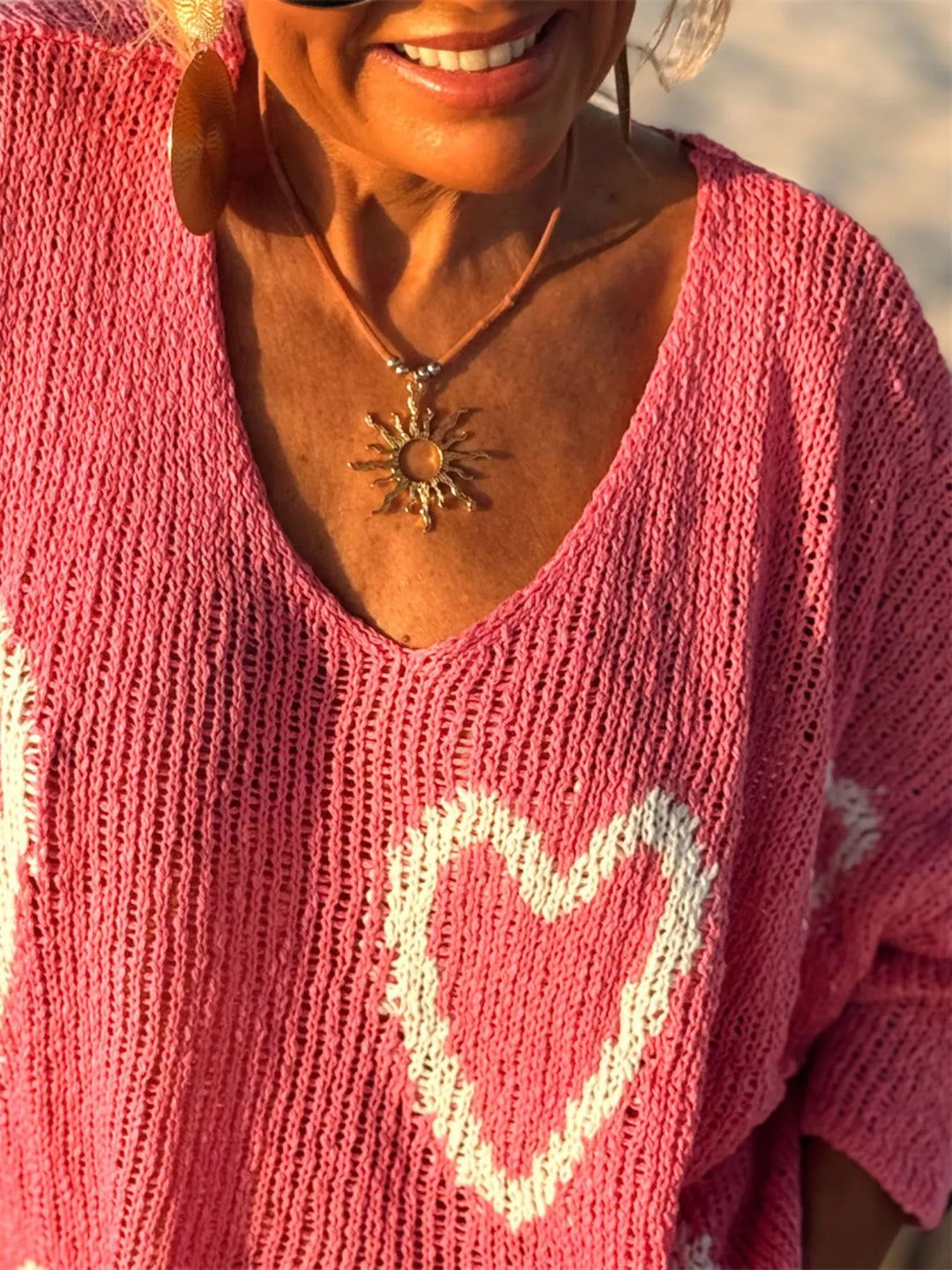 Heart motif V-neck dropped-shoulder knit sweater