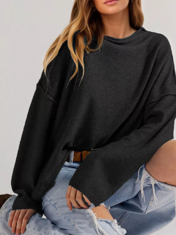 Black Exposed seam oversized knit sweater with wide sleeves