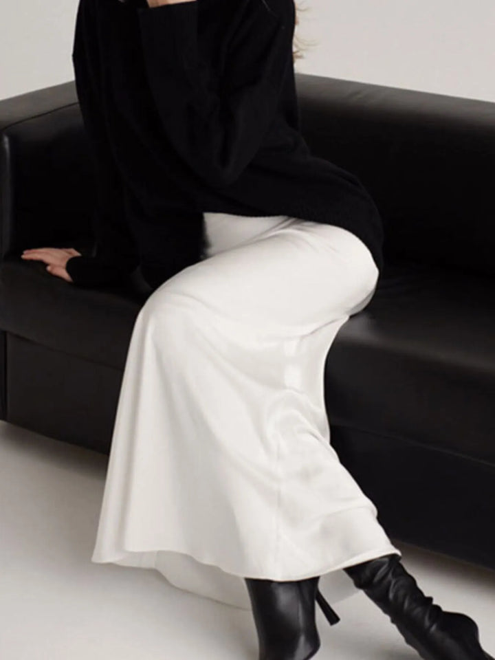 Fitted high-waist satin maxi skirt with flared hem