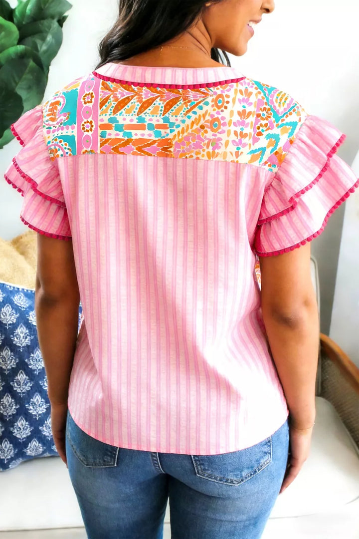 Patchwork mixed print blouse with ruffle sleeves and pom-pom trim