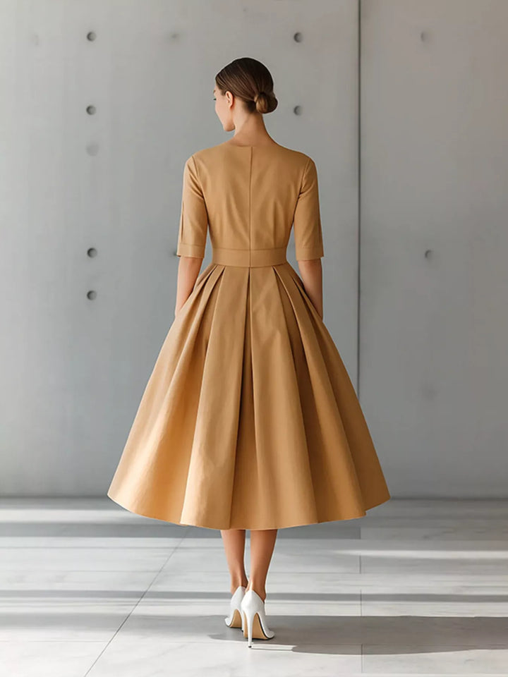 A-line pleated midi dress with side pockets