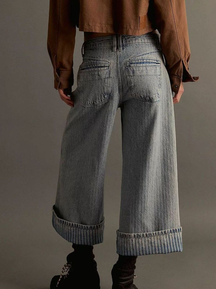 Wide-leg cropped jeans with deep cuffed hem and center seam