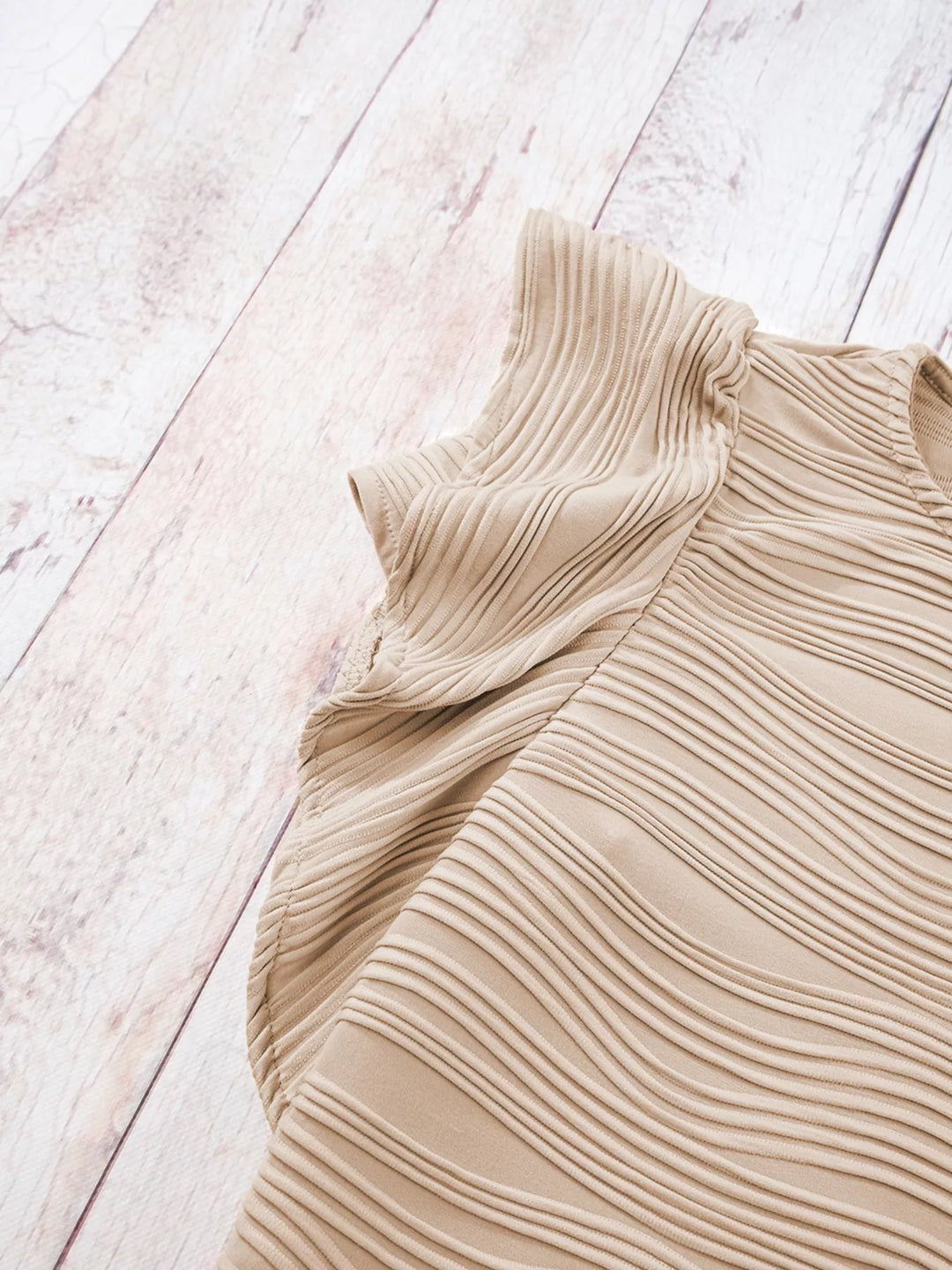 Wavy textured knit top with ruffle flutter sleeves