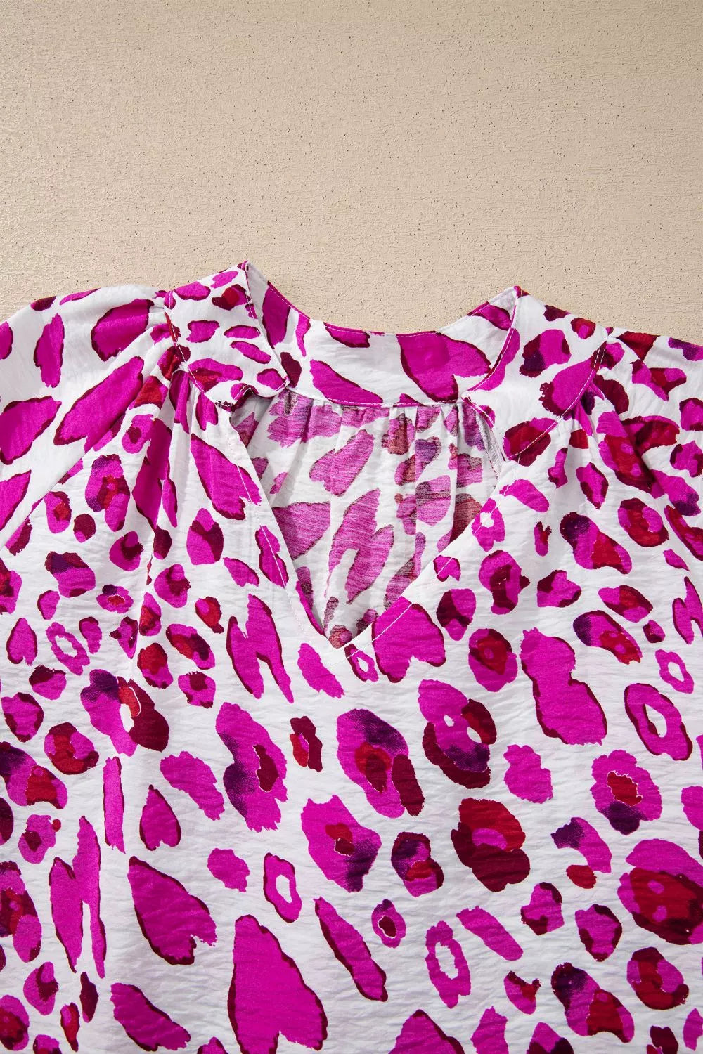 Leopard print V-neck blouse with puff sleeves