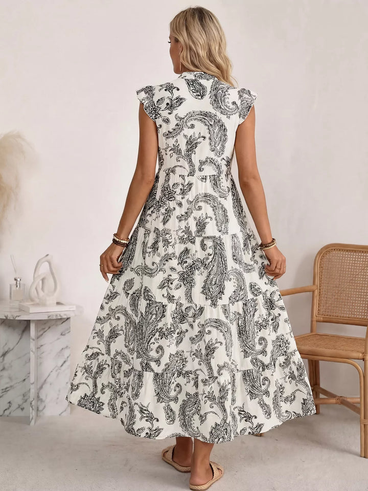 Notched neckline paisley tiered maxi dress with flutter sleeves