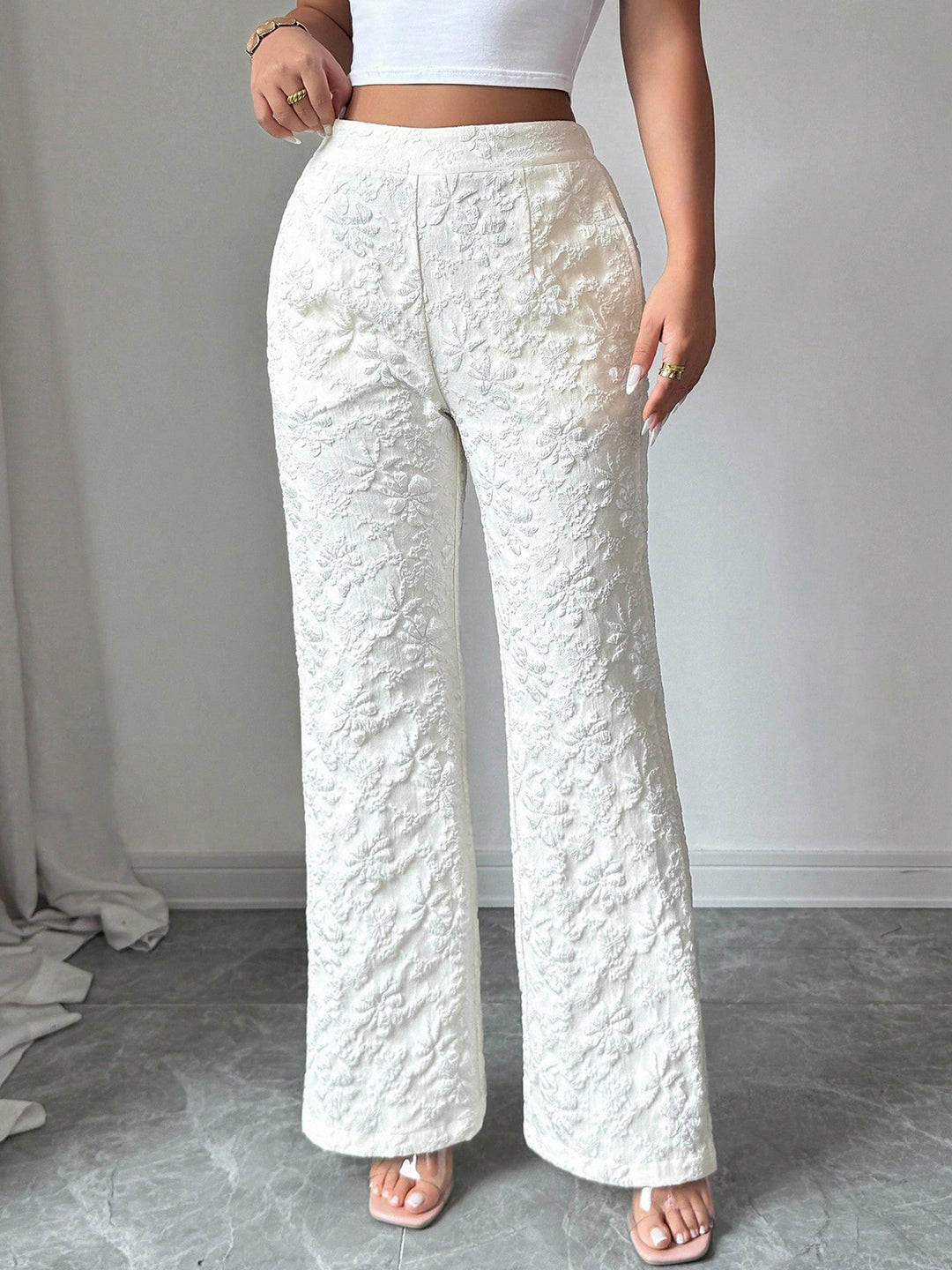 Textured floral high-rise wide-leg pants with pockets