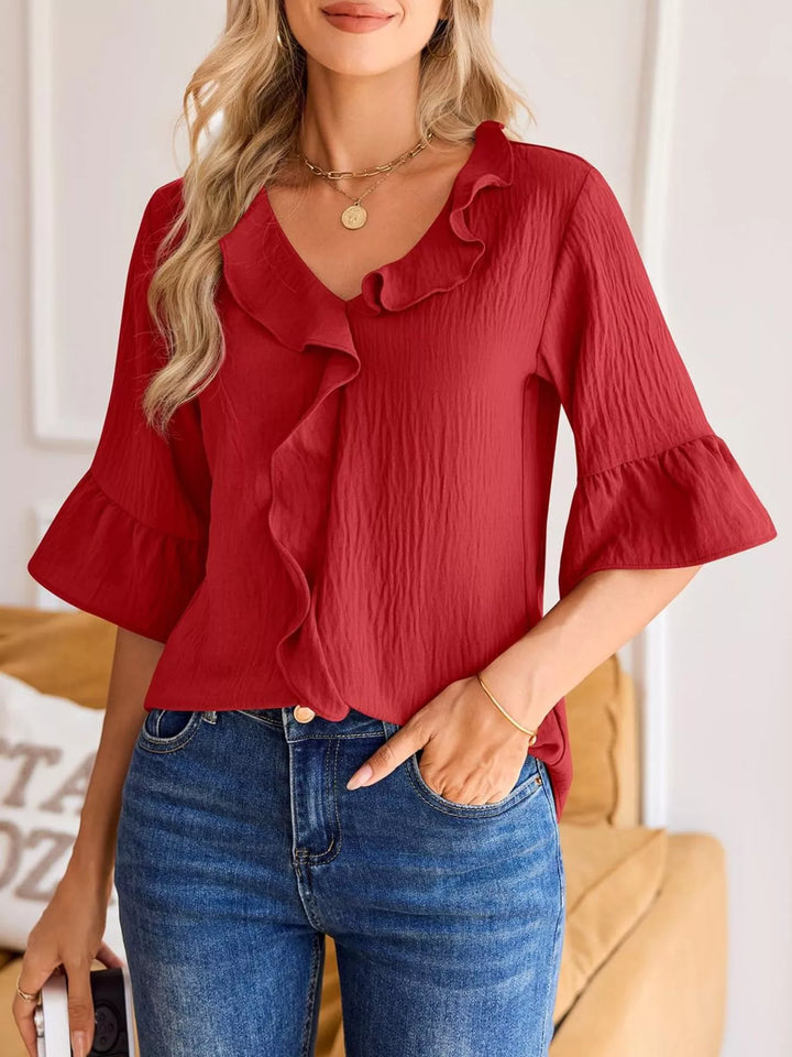 Ruffle trim V-neck blouse with flared bell sleeves