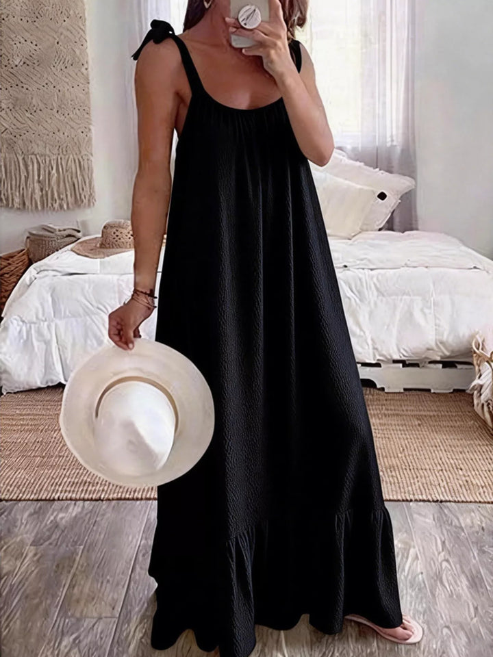 Black Tie-strap flowy maxi dress with ruffle hem