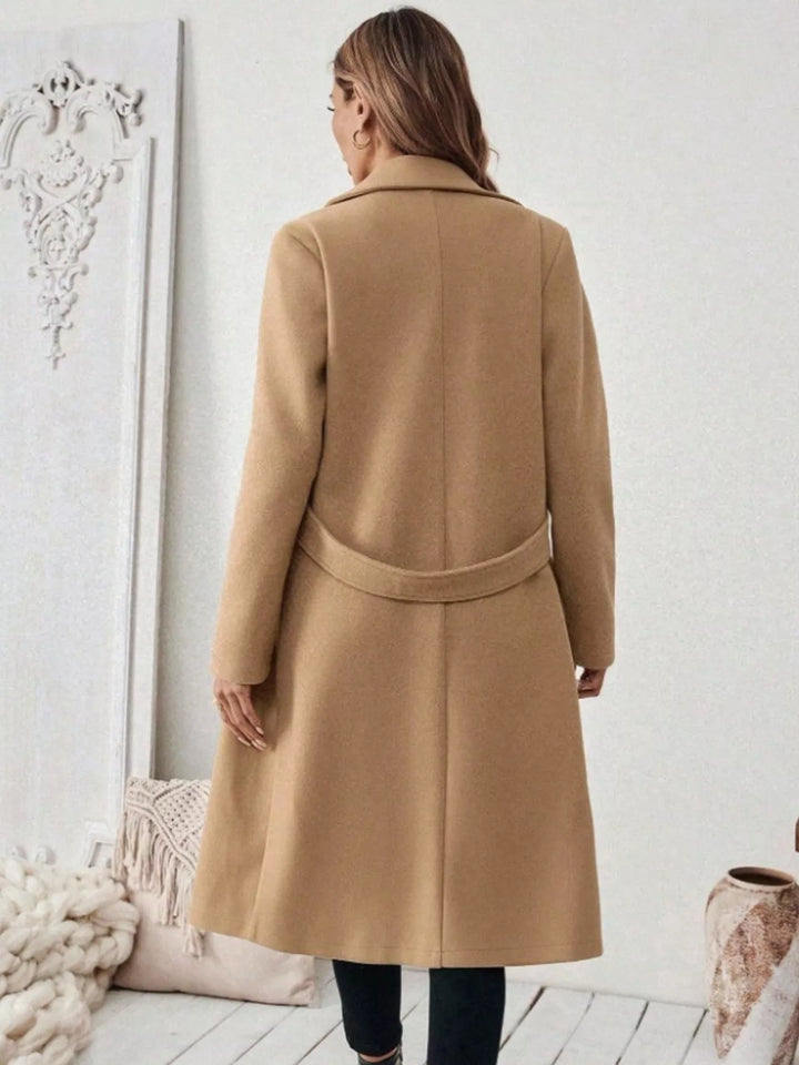 Notched lapel belted longline coat with side pockets