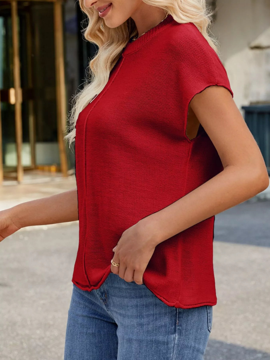 Short sleeve knit top with center seam and ribbed neck
