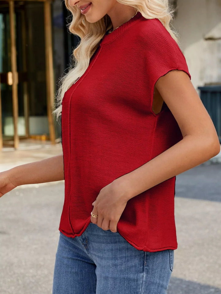 Short sleeve knit top with center seam and ribbed neck