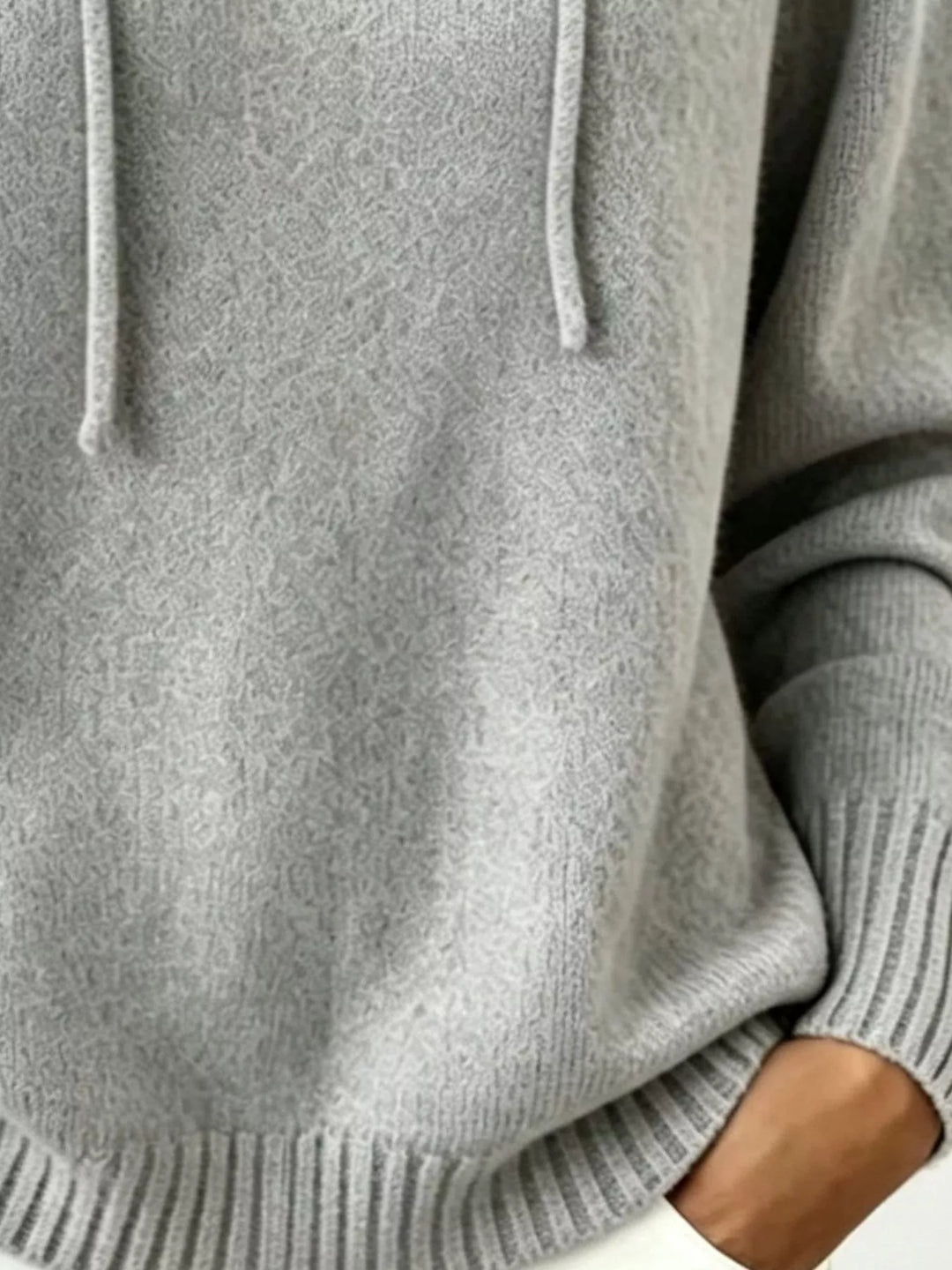Drawstring hooded knit pullover sweater with ribbed trim