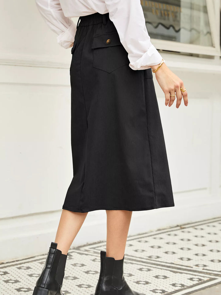 Ribbed high-waist midi skirt with front slit and pockets