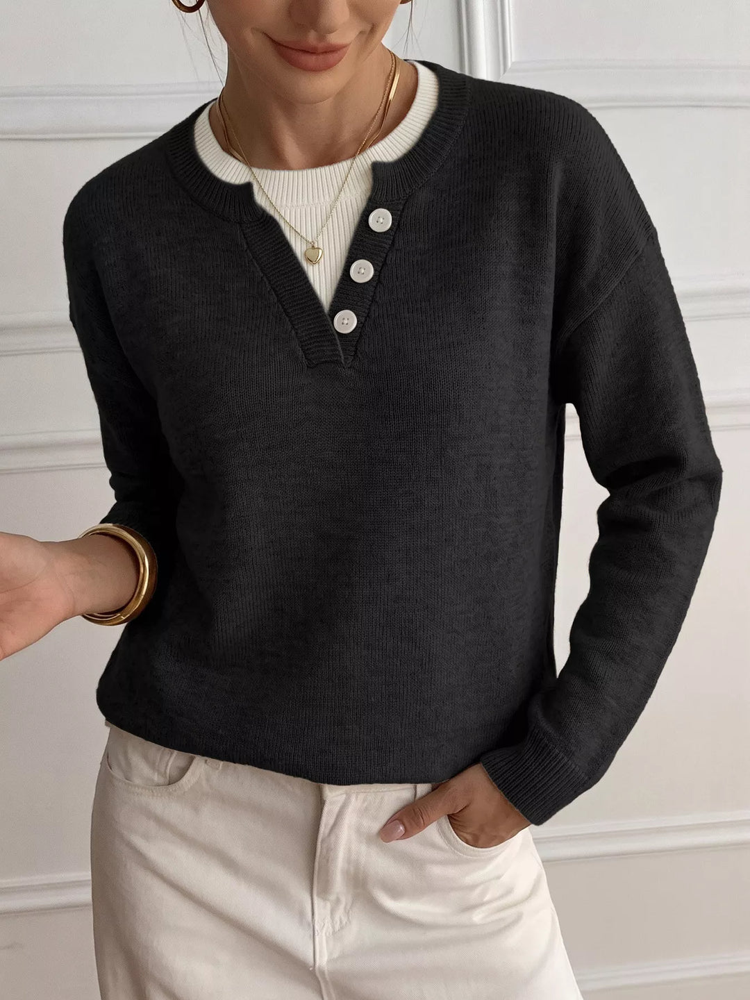 Three-button henley placket knit sweater with ribbed trim