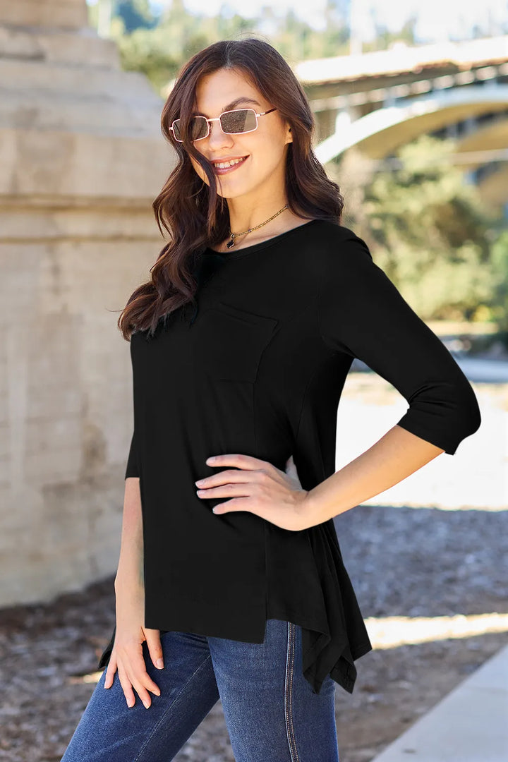 Pocketed 3/4 sleeve top with asymmetrical hem