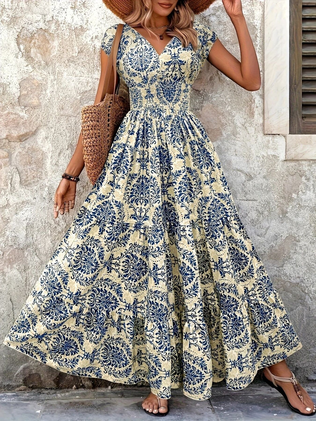 Smocked tiered maxi dress with cap sleeves and side slit
