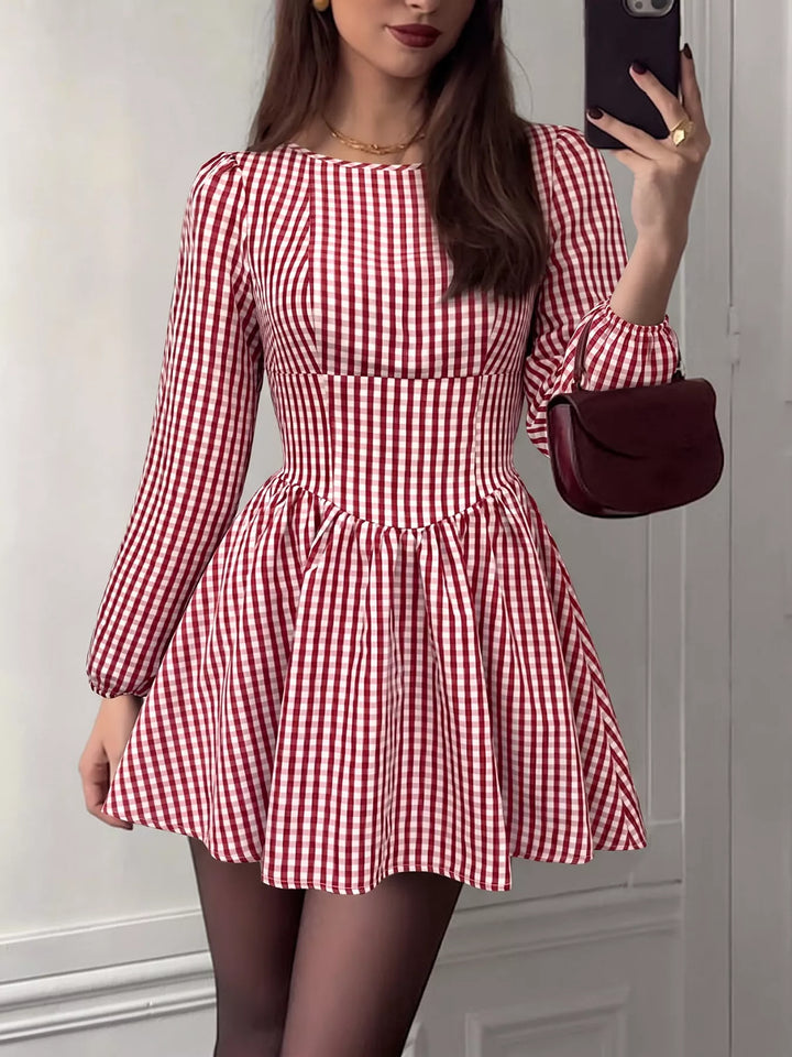 Backless gingham mini dress with bow tie and puff sleeves