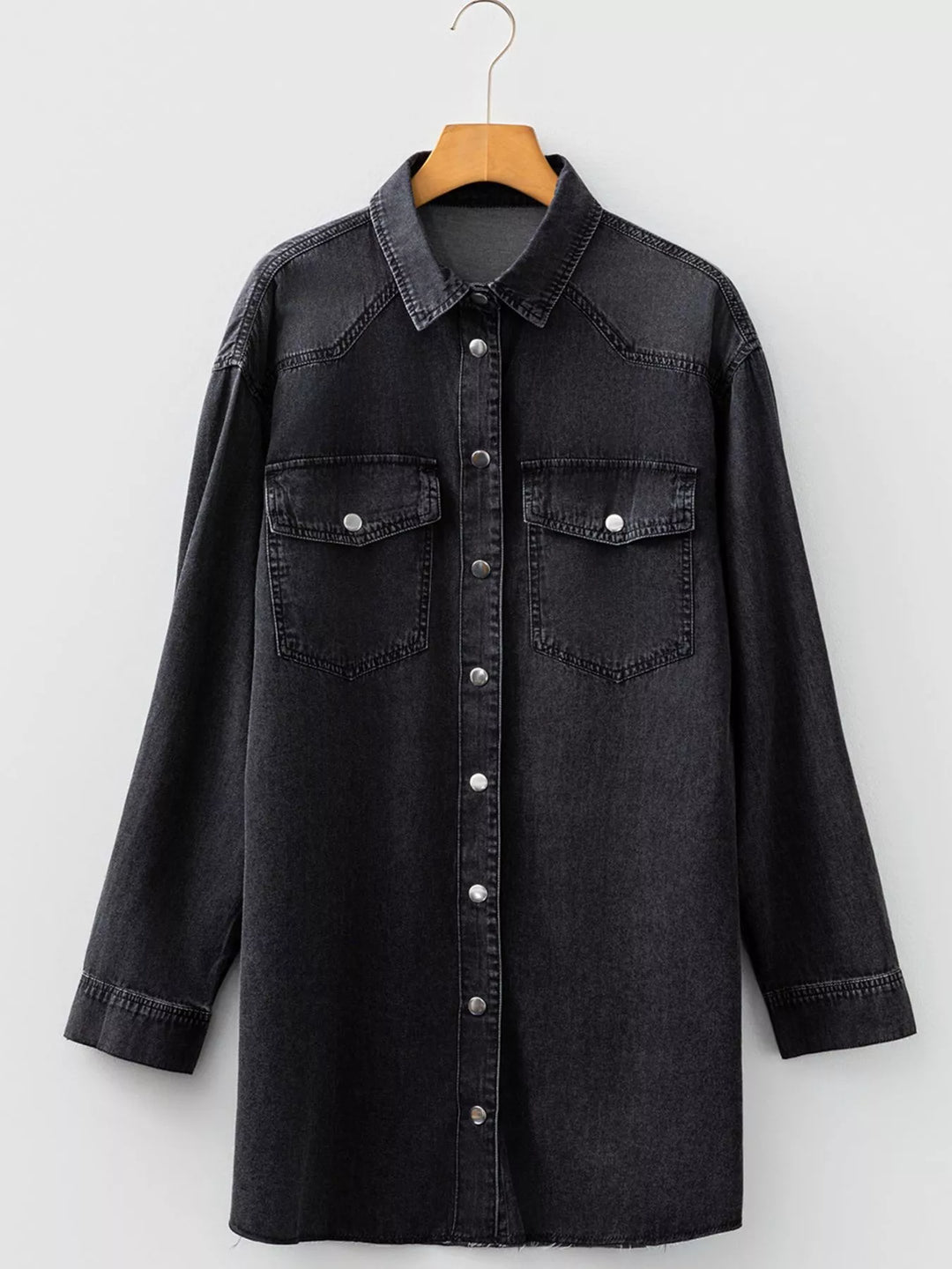 Loose-fit denim shirt dress with raw hem and chest pockets