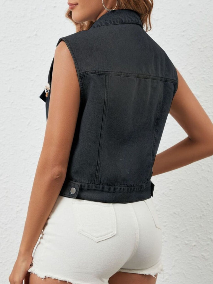 Sleeveless denim vest with shell and coin trim