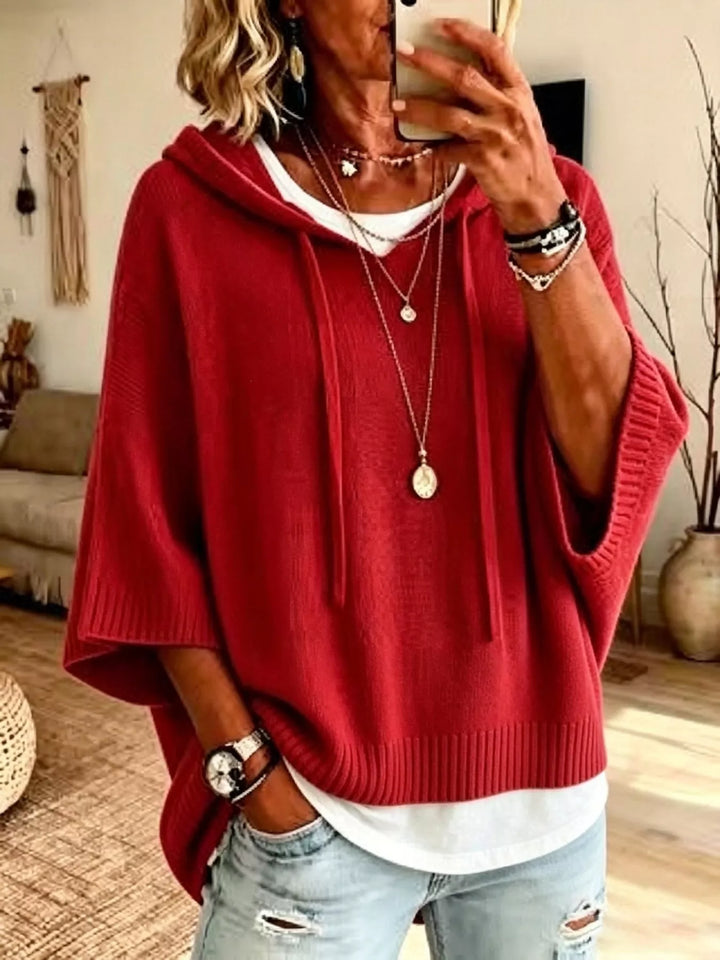 Hooded batwing sleeve knit sweater with drawstring