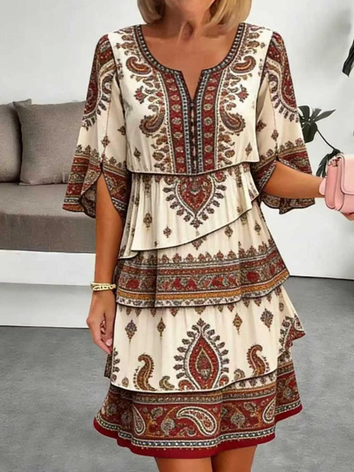 Apricot Tribal print tiered ruffle mini dress with notched neckline