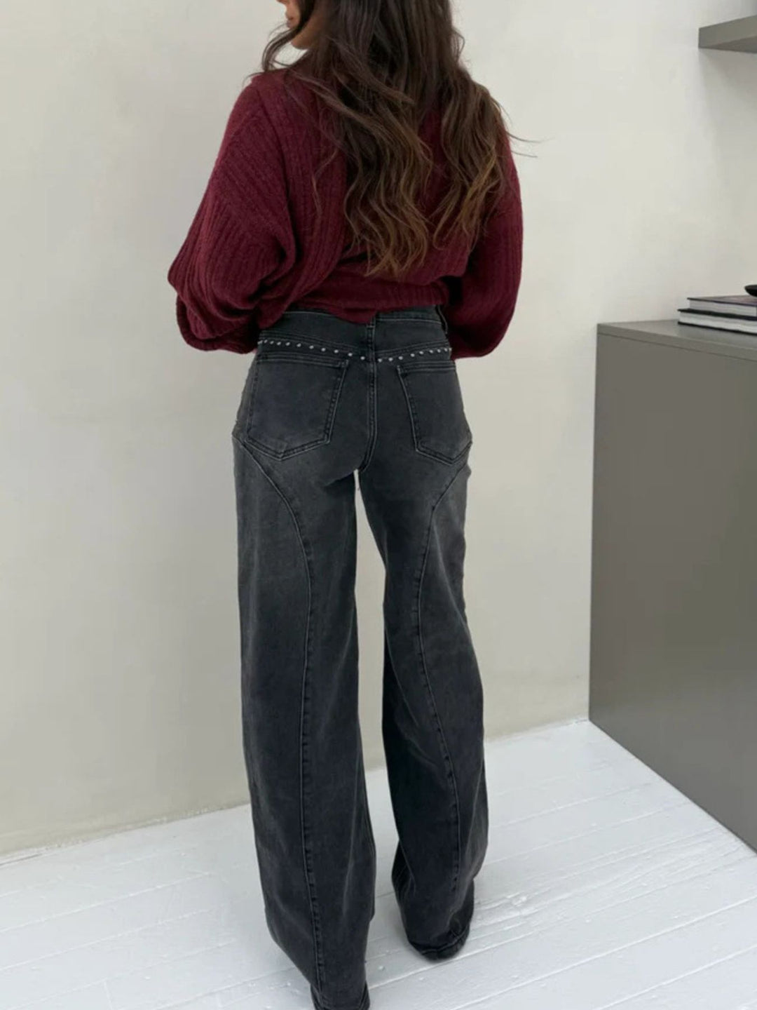 Studded high-rise wide-leg jeans with curved seam detail